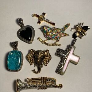Assorted Gold and Silver Tone Pendants and Brooches